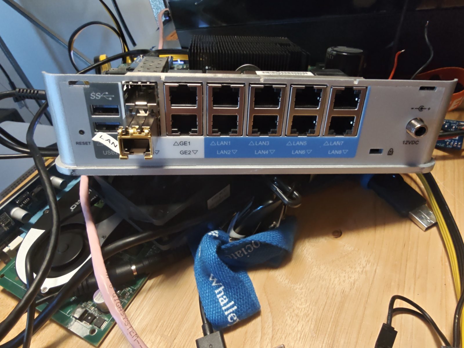 The back panel of the VeloCloud Edge 540: USB ports, two SFP cages, and ten RJ45 ports labelled GE1, GE2 and LAN1 to LAN8